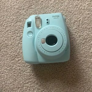 Mint green Polaroid camera
